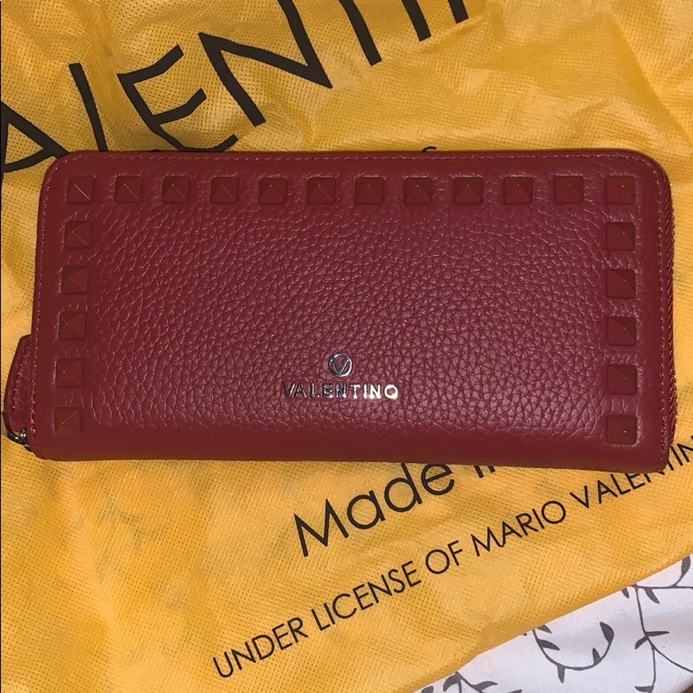 Dark red Mario Valentino wallet.